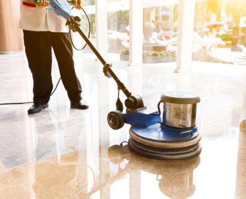 Person waxing floors